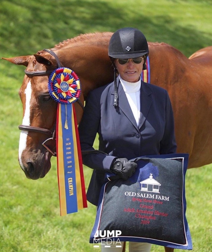 Patty Davis Raynes with one of her favorite horses, Touchdown, at a competition in North Salem, NY.