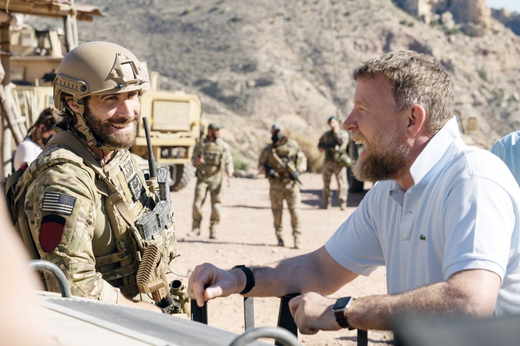 Jake Gyllenhaal and Guy Ritchie on the set of "The Covenant." 