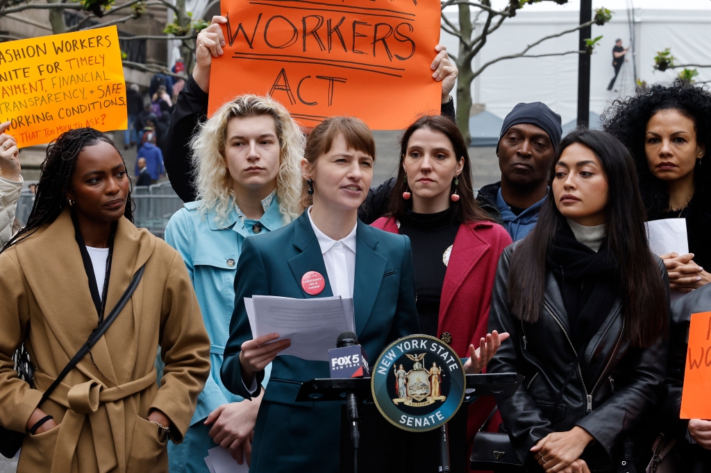 Model Alliance founder Sara Ziff speaking at Sunday's event surrounded by models and advocates. 