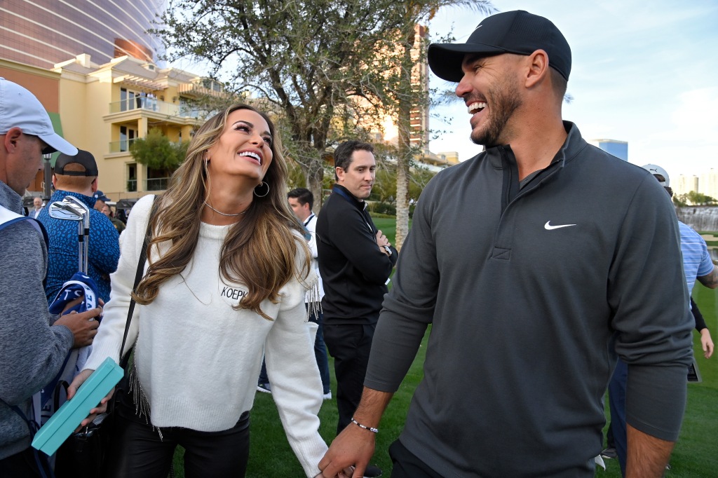 Brooks Koepka (right) and Jena Sims (left) et at the 2015 Masters tournament in Georgia before going public in 2017.