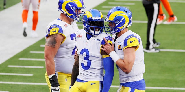 Odell Beckham Jr. #3 of the Los Angeles Rams reacts after scoring a touchdown with teammate Matthew Stafford #9 during Super Bowl LVI at SoFi Stadium on February 13, 2022 in Inglewood, California.