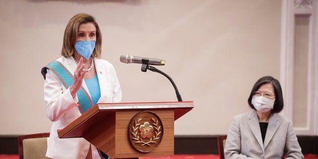 Then-House Speaker Nancy Pelosi (D-CA), left, speaks after receiving the Order of Propitious Clouds with Special Grand Cordon, Taiwan’s highest civilian honor, from Taiwanese President Tsai Ing-wen, right, at the president's office on Aug. 3, 2022, in Taipei, Taiwan.