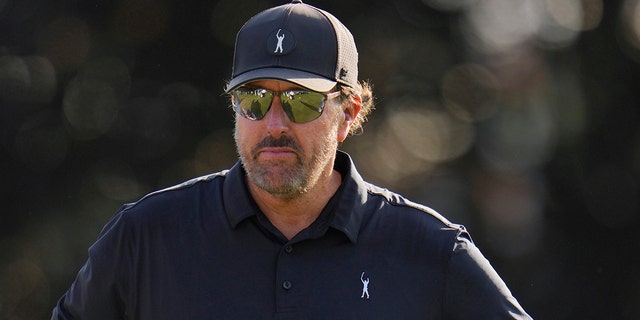 Phil Mickelson waits to hit on the 16th hole during the first round of the U.S. Open golf tournament at The Country Club, Thursday, June 16, 2022, in Brookline, Mass. 