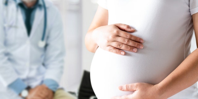 Pregnant woman at doctor's office