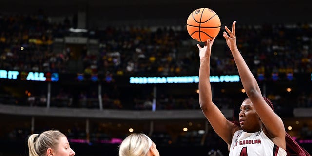 Aliyah Boston (4) of the South Carolina Gamecocks shoots against the Iowa Hawkeyes during the semifinals of the NCAA Tournament Final Four at American Airlines Center March 31, 2023, in Dallas. 