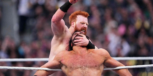 Sheamus chops Drew McIntyre during WrestleMania at SoFi Stadium, April 2, 2023, in Inglewood, California.