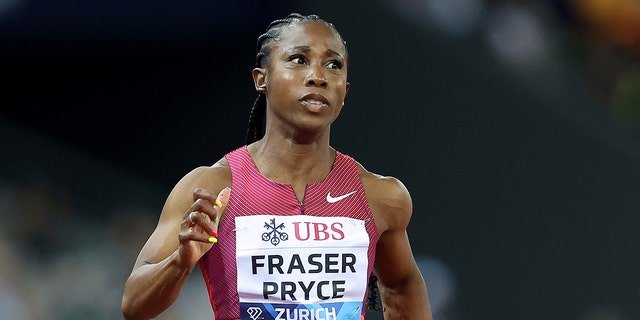 Shelly-Ann Fraser-Pryce crosses the finish line to win Women's 100 Metres before Marie-Josee Ta Lou and Shericka Jackson during the Weltklasse Zurich 2022, part of the 2022 Diamond League series at Stadion Letzigrund on Sept. 8, 2022 in Zurich.