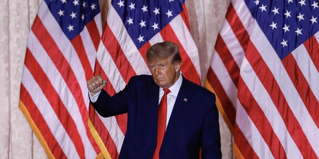 Former President Donald Trump gestures after speaking at the Mar-a-Lago Club in Palm Beach, Florida, on Tuesday, Nov. 15, 2022. 