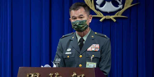 In this photo released by the Taiwan Ministry of National Defense, Major general Huang Wen-chi, the assistant deputy chief of general staff for intelligence speaks during a press conference in Taipei, Taiwan, Tuesday, Feb. 14, 2023. Amid speculation over alleged Chinese spy balloons, Taiwan's Defense Ministry said Tuesday it would shoot down any suspected military object coming close to its shores from mainland China. 