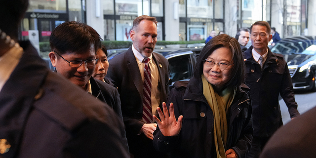 Taiwan's President Tsai Ing-wen waves as she arrives at a hotel in New York City on Thursday, March 30.