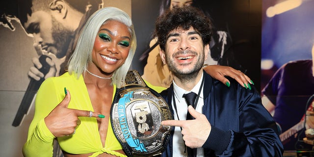 Jade Cargill and President of All Elite Wrestling Tony Khan attend TBS's AEW Dynamite Los Angeles Debut After Party at The Forum on June 1, 2022, in Inglewood, California.