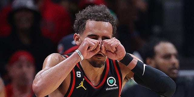 Trae Young makes crying eyes