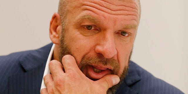 WWE Executive Vice President of Talent, Live Events &amp; Creative Paul "Triple H" Levesque talks during an interview before a taping of the WWE's NXT show at Full Sail University in Winter Park, Fla., Nov. 30, 2016.