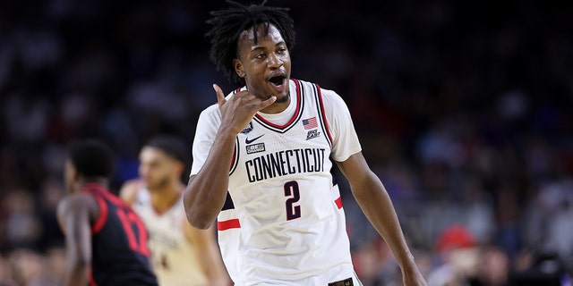 Tristen Newton #2 of the Connecticut Huskies reacts during the first half San Diego State Aztecs during the NCAA Men's Basketball Tournament National Championship game at NRG Stadium on April 03, 2023 in Houston, Texas.
