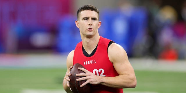 Quarterback Stetson Bennett of Georgia participates in a drill during the NFL Combine at Lucas Oil Stadium on March 04, 2023 in Indianapolis, Indiana. 