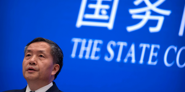 Shen Hongbing, the director of the Chinese Center for Disease Control and Prevention, speaks at a press conference on the origins of COVID-19 at the State Council Information Office in Beijing, Saturday, April 8, 2023.