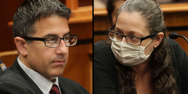 Michael Valva and Angela Pollina sit together inside Suffolk County Supreme Court Judge William Condon's courtroom for their murder trials in Riverhead, New York on Monday, Sept. 12, 2022.