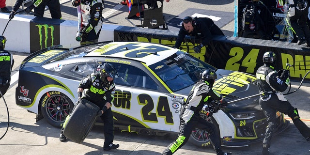 William Byron (24) completes a pit stop during a NASCAR Cup Series auto race at Richmond Raceway on Sunday, April 2, 2023, in Richmond, Va. 