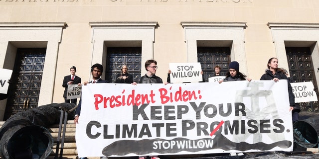 Climate activists hold a demonstration to protest the Willow Project