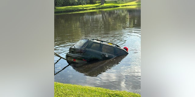 car pulled from pond