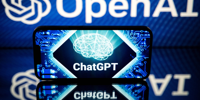 This picture taken on January 23, 2023 shows screens displaying the logos of OpenAI and ChatGPT. - ChatGPT is a conversational artificial intelligence software application developed by OpenAI. (Photo by Lionel BONAVENTURE / AFP) (Photo by LIONEL BONAVENTURE/AFP via Getty Images)