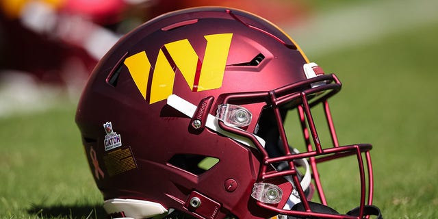 A general view of a Washington Commanders helmet on the field before the game against the Tennessee Titans at FedExField on October 9, 2022 in Landover, Maryland.