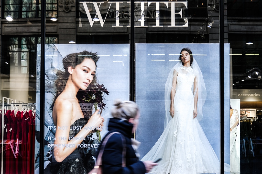 The country's largest bridal retailer fired its first round of employees Friday and plans to lay off the rest in two separate phases that will stretch through August.