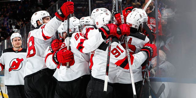 Devils mob after overtime win