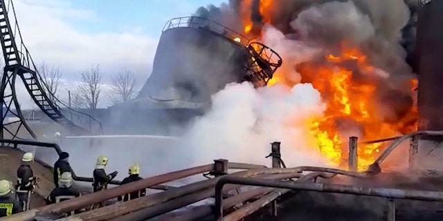 These images show Ukrainian firefighters tackling a blaze at an industrial fuel storage company in Lutsk, Ukraine, following a Russian missile strike on the facility.