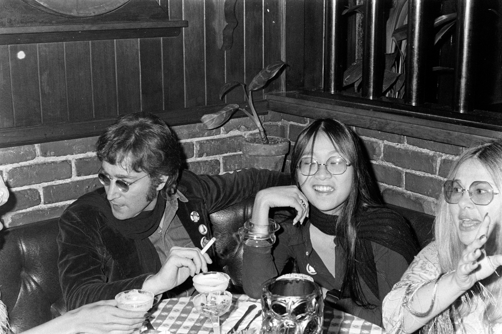 A picture of John Lennon, May Pang, and Sue Mengers (L-R).