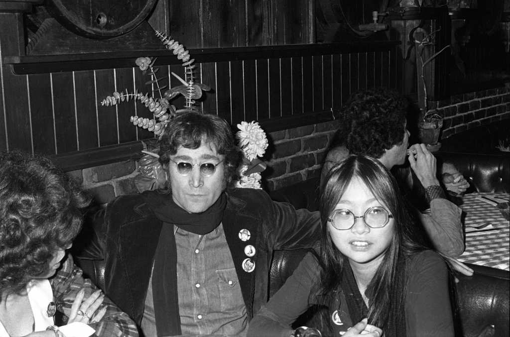 John Lennon (with May Pang on right) once said that he was "acting like a teenager in Hollywood."