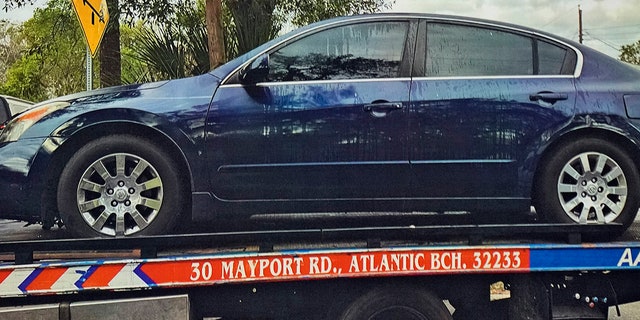 Photo of the suspect car that was involved in a shooting Tuesday, Jan. 31, 2023, in Lakeland, Fla.  Police say several people were shot and wounded during a drive-by shooting in a central Florida neighborhood.