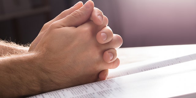 Close-up of a man praying