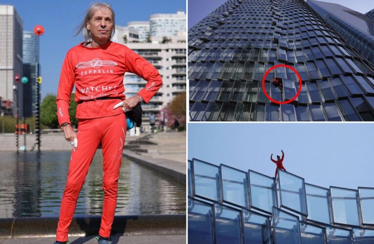 ‘French Spiderman’ climbs building in protest of pension law