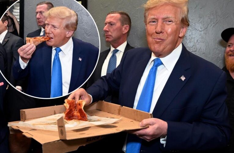 Trump makes surprise visit to supporters in Florida pizzeria
