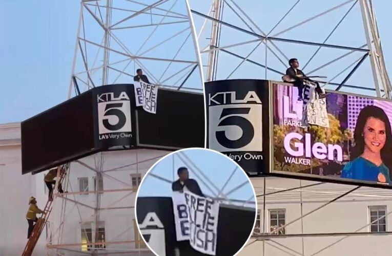 Man scales Hollywood’s TV tower, waves ‘Free Billie Eilish’ sign