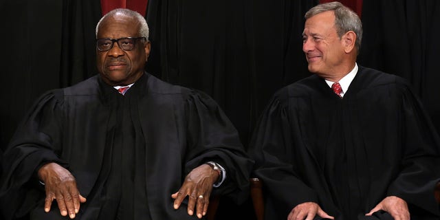 Democrats have requested that Supreme Court Chief Justice John Roberts (right) open an investigation into previously undisclosed trips Associate Justice Clarence Thomas accepted from his friend, billionaire GOP megadonor Harlan Crow. 