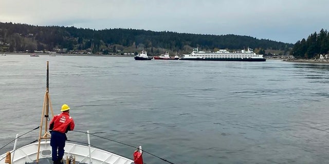 U.S. Coast Guard Pacific Northwest responded to assist local ferries disembark passengers from the stranded vessel in Rich Passage.