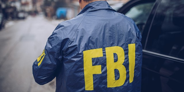 FBI agent wearing a FBI jacket