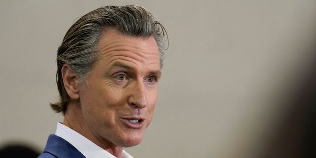 Newsom smirks