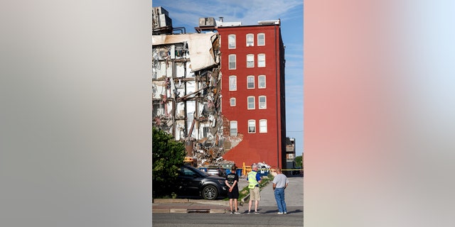 A photo of the collapsed building