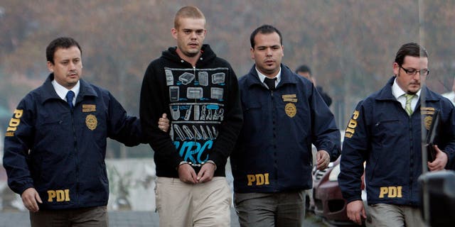 Joran Van der Sloot with police at airport 2010