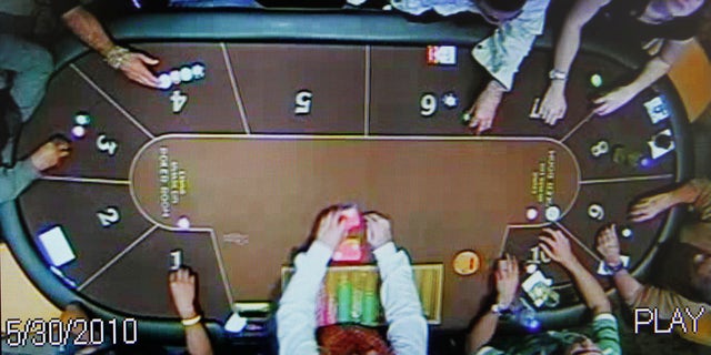 A video grab image shows Dutch Joran Van der Sloot and Peruvian Stephany Flores playing at a casino in Lima