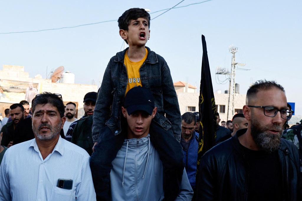 The son (center) of Palestinian prisoner Khader Adnan shouts during the rally in the Israeli-occupied West Bank on May 2, 2023.