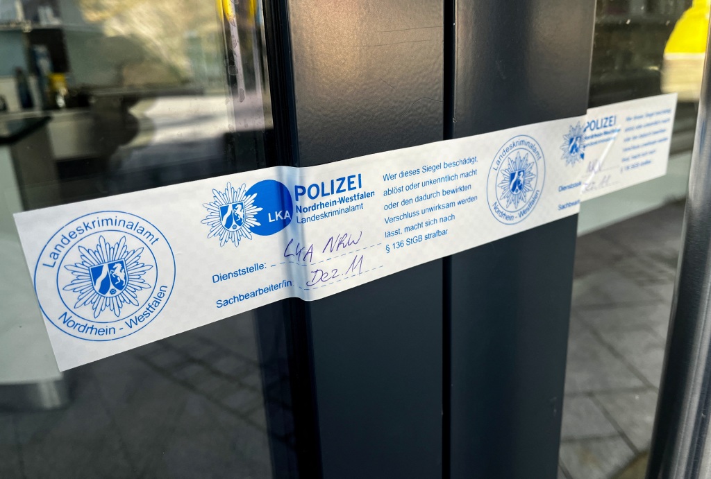 A police seal sticks at a door in Siegen, Germany, on May 3, 2023, after German police arrested dozens of people across the country on Wednesday in an investigation of the Italian 'Ndrangheta organized crime group. 