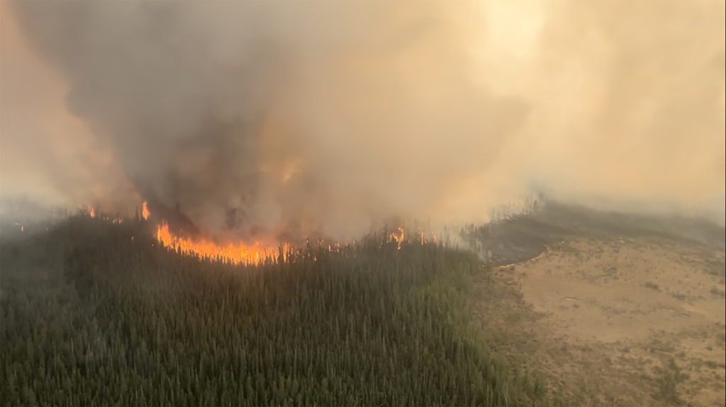 A fire burns near Fox Lake, Alberta, Canada on May 9, 2023.