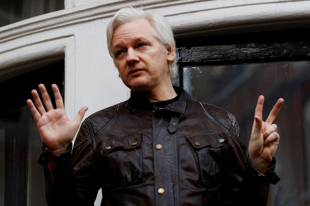 Julian Assange is seen on the balcony of the Ecuadorian Embassy in London, Britain, on May 19, 2017. 