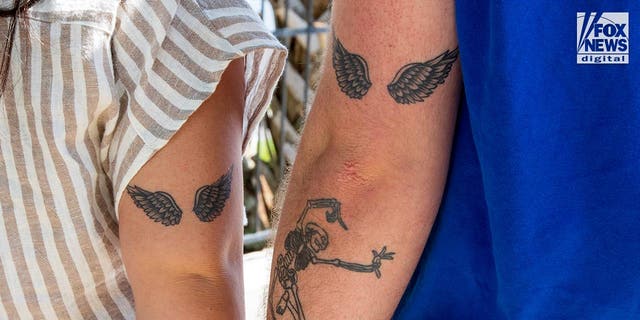 Madison Brooks heroes with matching tattoos of angel wings on their arms