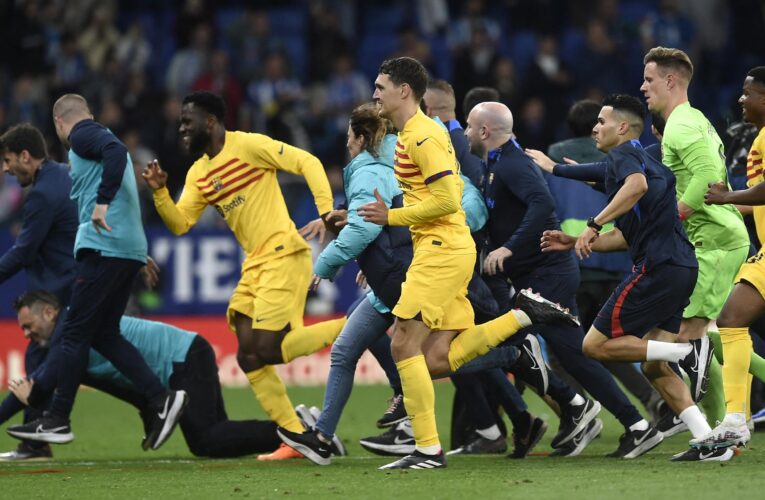 Barcelona players chased off pitch by Espanyol fans after celebrating Liga title win on away soil