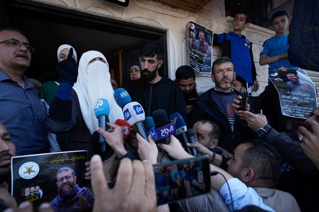 Randa, wife of Khader Adnan speaks to the media in the West Bank village of Arrabe, near Jenin, on May 2, 2023.